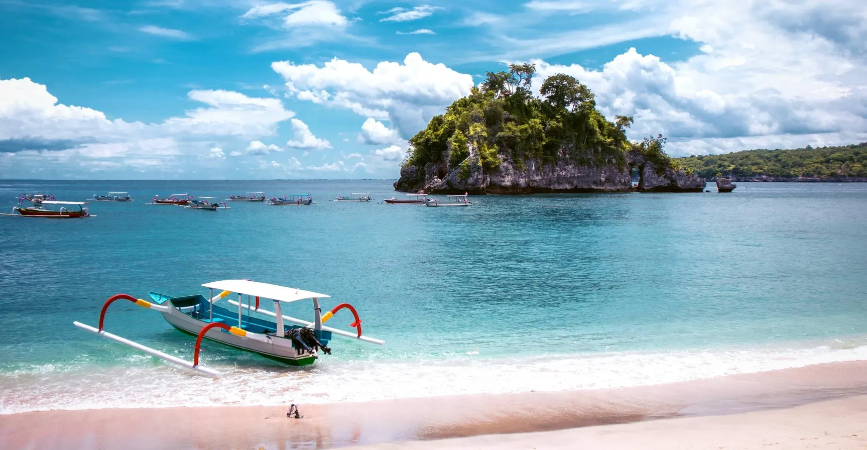 Boats mooring on Crystal Bay beach