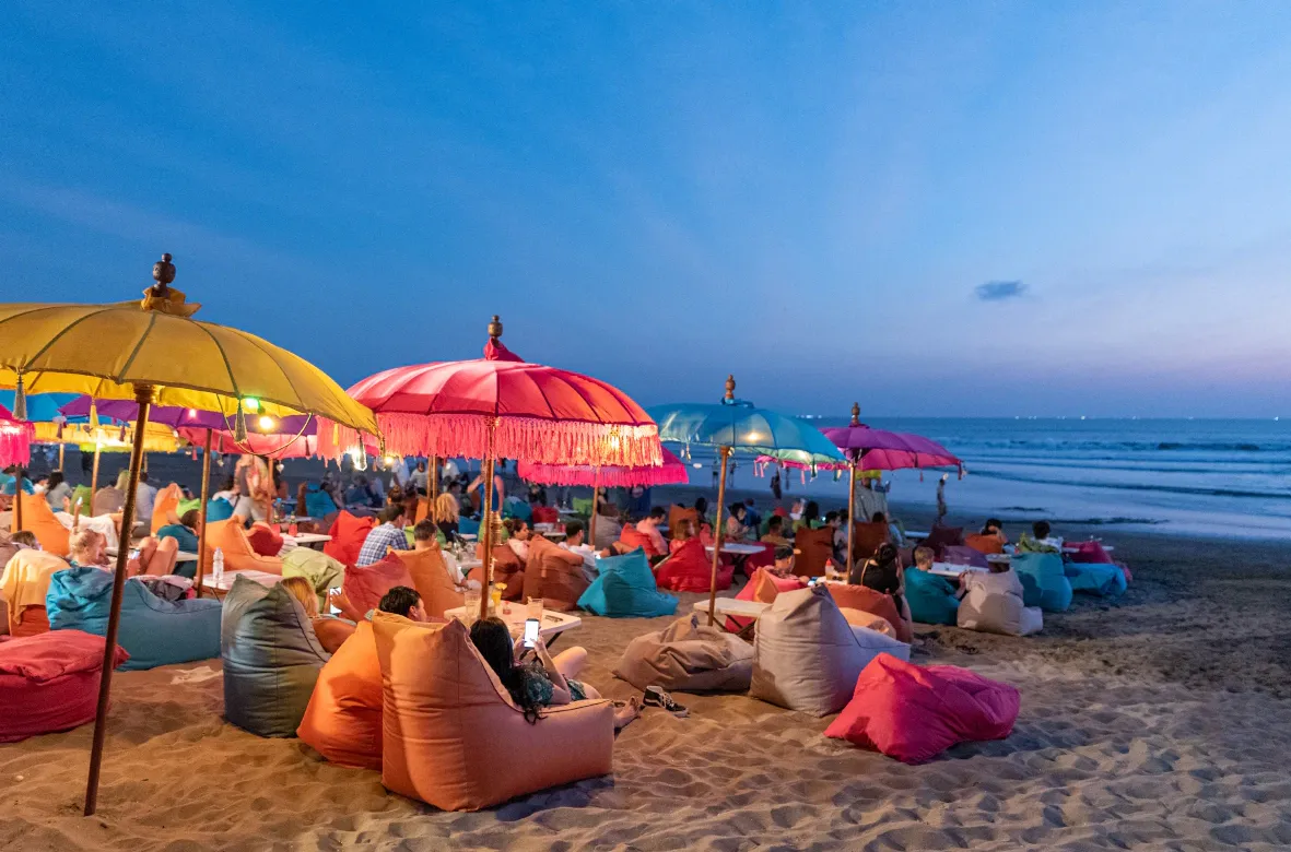 People enjoy sunset on Kuta and Seminyak