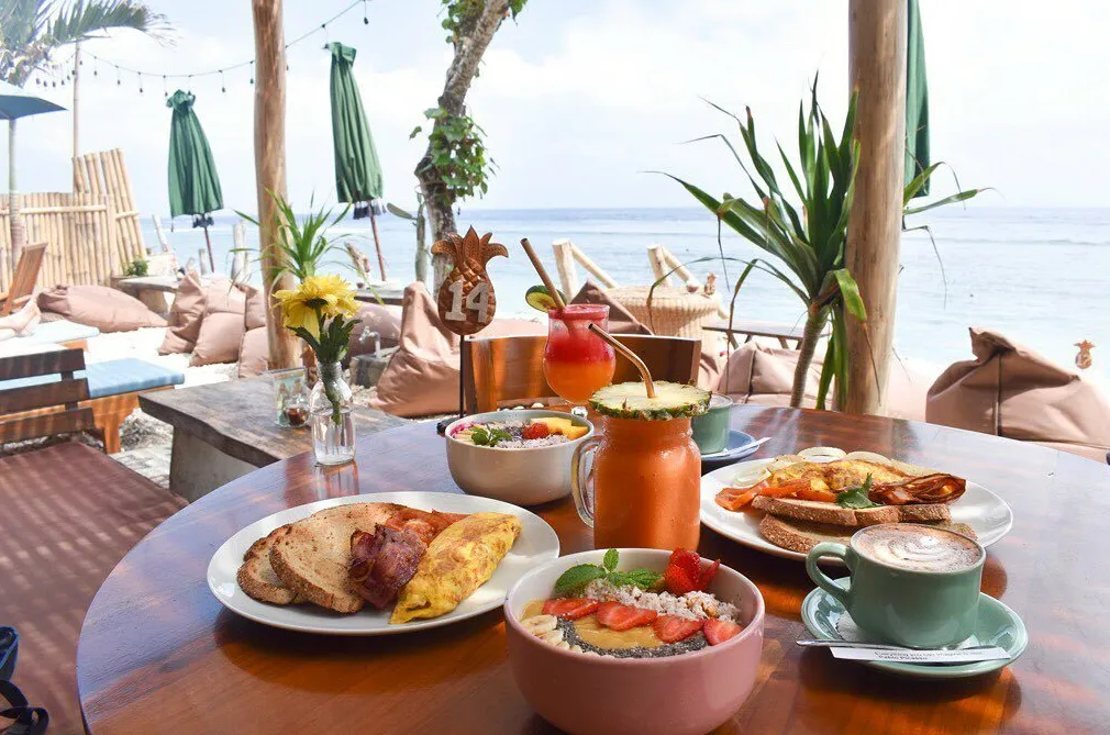 Enjoy delicacy by beachfront restaurant